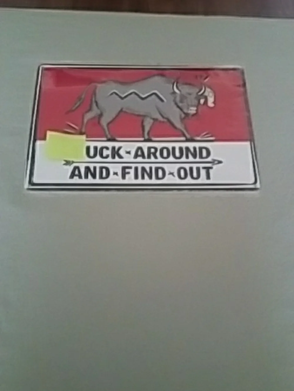 Red and White Metal Bull Sign